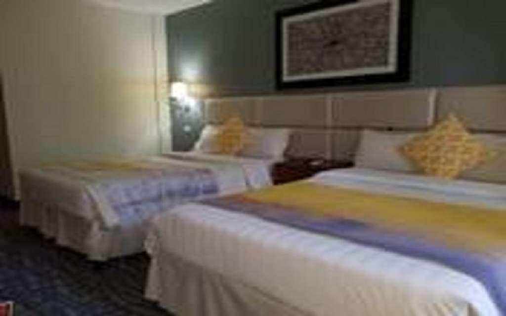 Century Hotel Garapan Pokoj fotografie